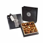 Bolci  Lata negra de bombones 250g.